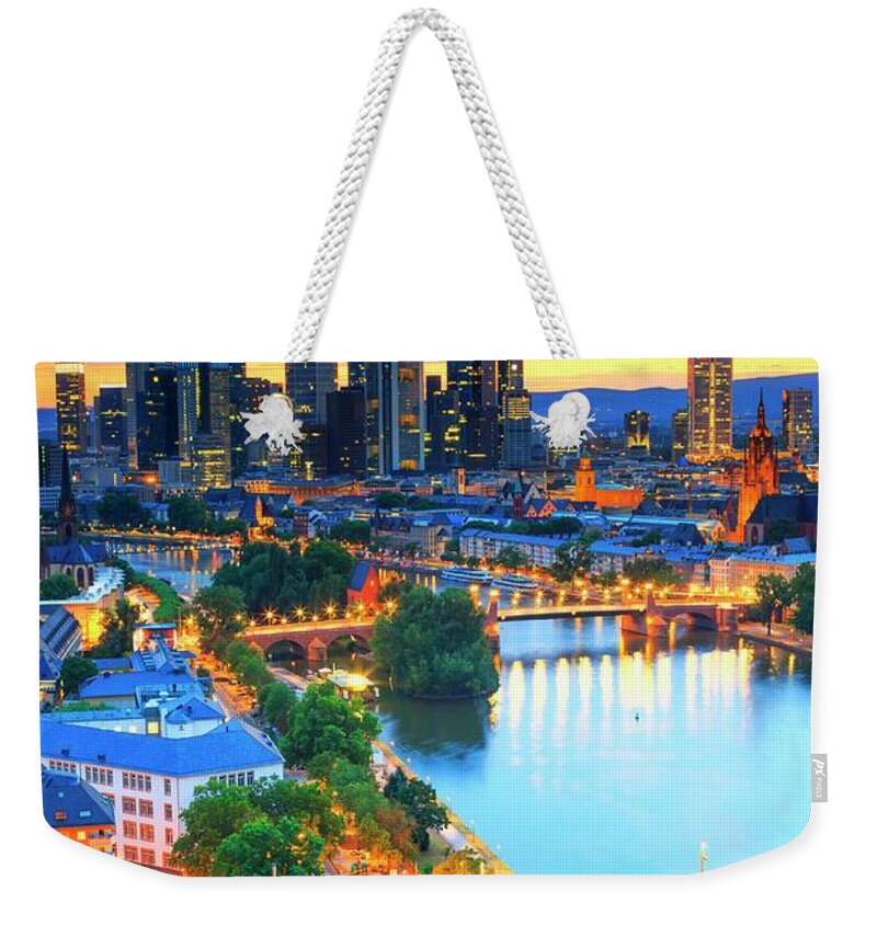 Estock Weekender Tote Bag featuring the digital art Germany, Hessen, Frankfurt Am Main, The Skyline Of The City With The Skyscrapers Of The Banks District Along The Main River by Maurizio Rellini