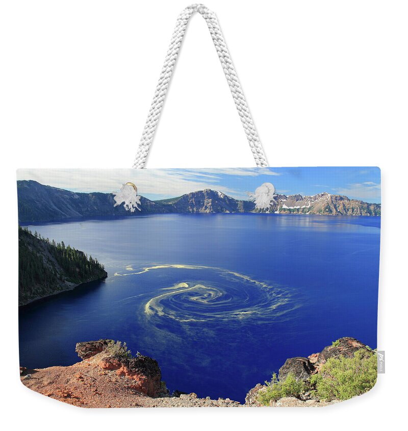 Crater Lake Weekender Tote Bag featuring the photograph Giant Swirl Of Pollen At Crater Lake by Pierre Leclerc Photography