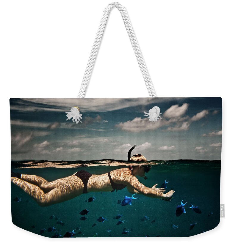 People Weekender Tote Bag featuring the photograph Girl Snorkelling In Indian Ocean by Rjw