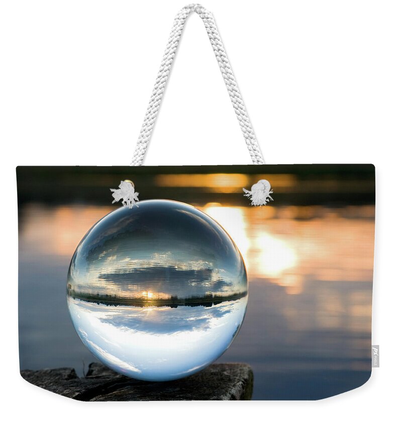 Curve Weekender Tote Bag featuring the photograph Glass Ball At Sunset by Diephosi