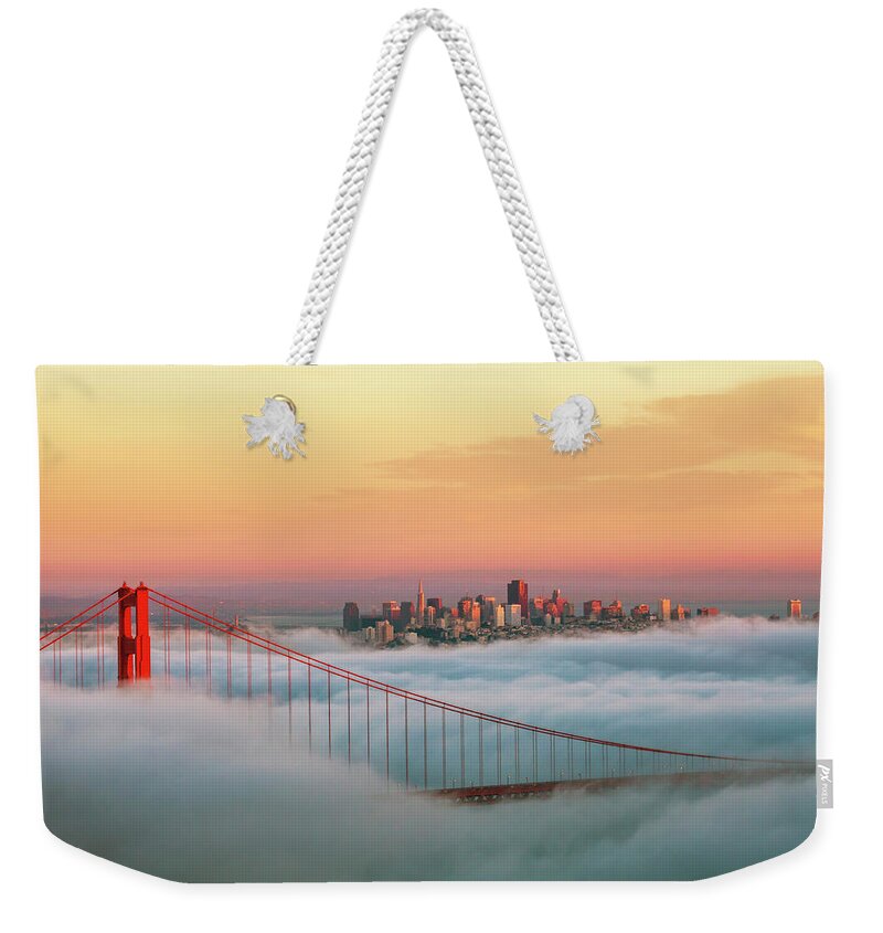 Scenics Weekender Tote Bag featuring the photograph Golden Gate Bridge by Nithi Asavapanumas