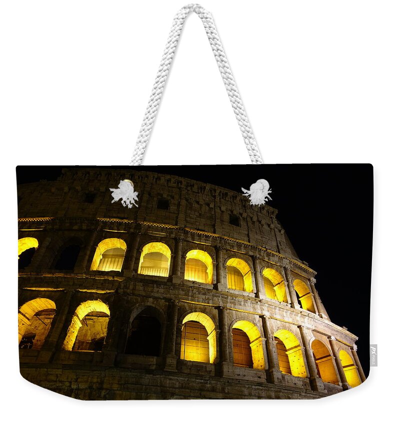 Colosseum At Night Weekender Tote Bag featuring the photograph Golden glow by Patricia Caron
