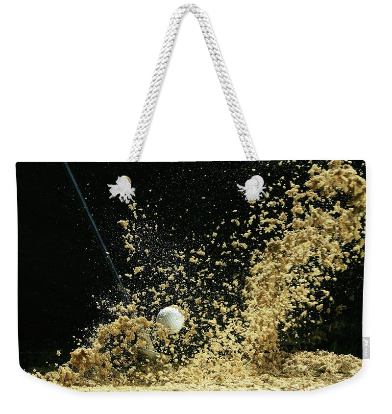 Sand Trap Weekender Tote Bag featuring the photograph Golf Ball Being Hit by Kolbz