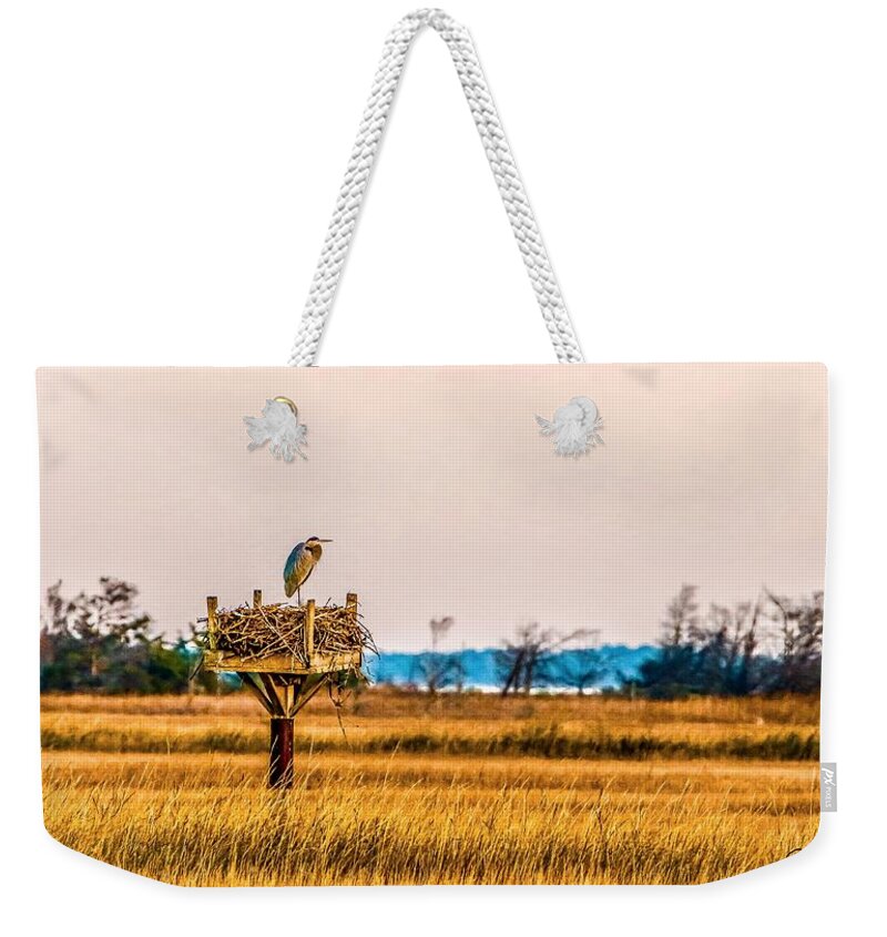 Osprey Weekender Tote Bag featuring the photograph Great Heron on Osprey's Nest by Shawn M Greener