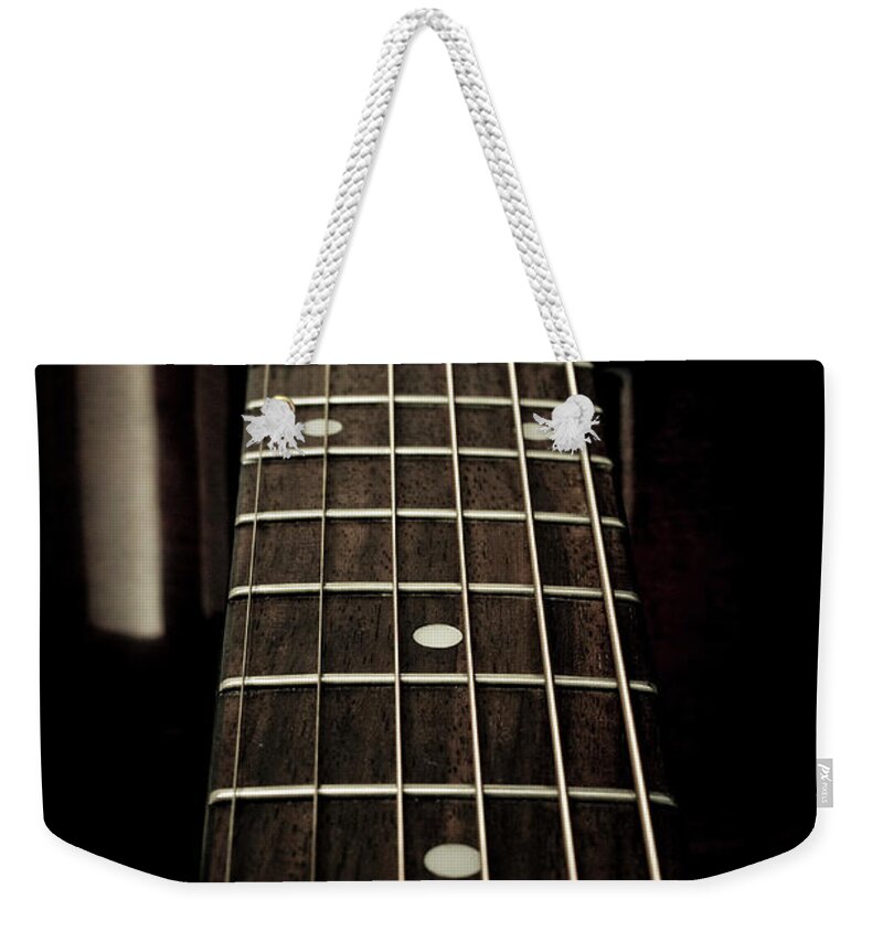 Music Weekender Tote Bag featuring the photograph Guitar Detail by Tsuji