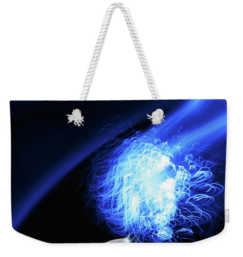 People Weekender Tote Bag featuring the photograph Hand Connecting With An Ethereal Ball by Steven Puetzer