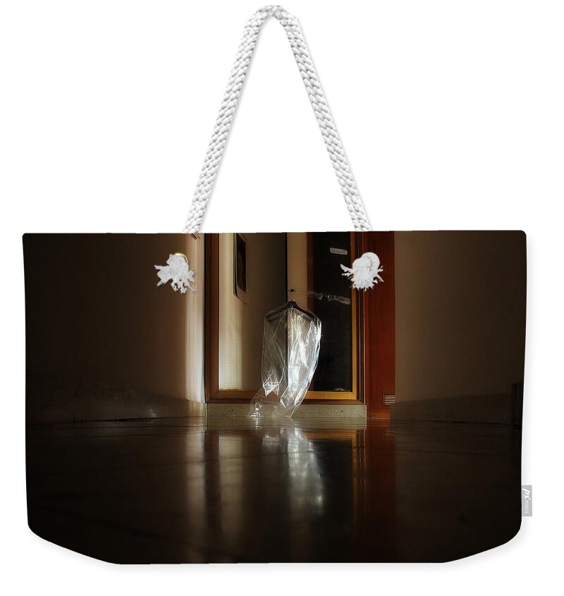 Coathanger Weekender Tote Bag featuring the photograph Hanging In The Mirror by Roripalazzo.com