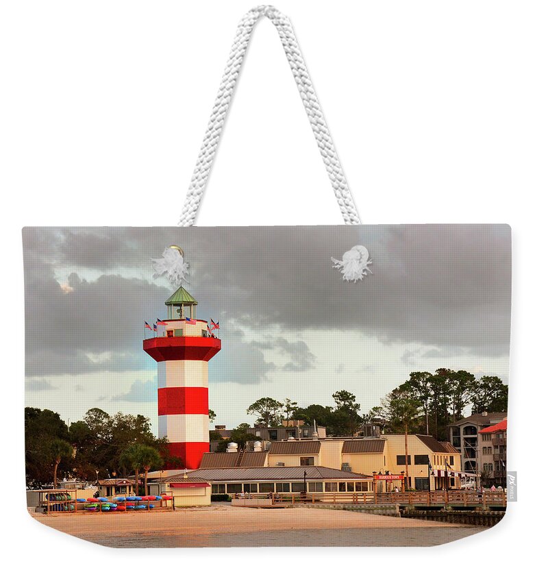 Lighthouse Weekender Tote Bag featuring the photograph Harbortown Lighthouse at Sunset by Jerry Griffin