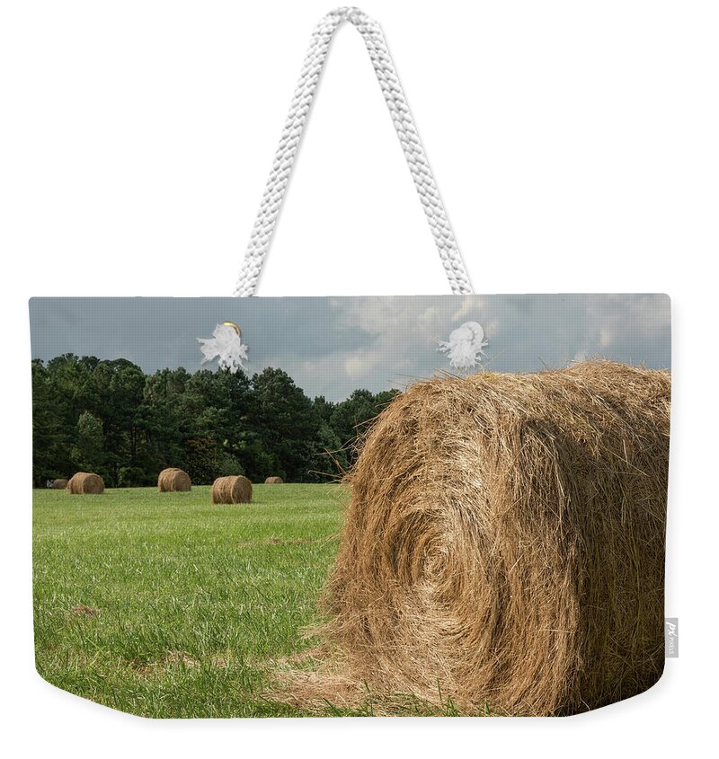 Hay Bales Weekender Tote Bag featuring the photograph Hay Bales by Minnie Gallman