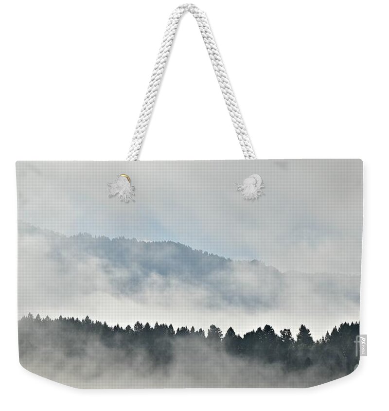 Clouds Weekender Tote Bag featuring the photograph Here There Be Dragons by Dorrene BrownButterfield
