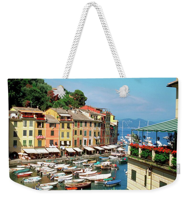 Row House Weekender Tote Bag featuring the photograph High Angle View Of A Harbor, Portofino by Medioimages/photodisc