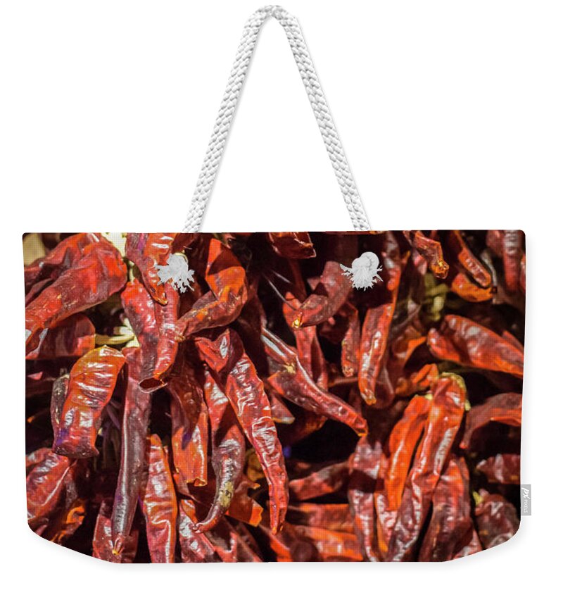 Red Weekender Tote Bag featuring the photograph Hot Spicy Peppers by Pheasant Run Gallery