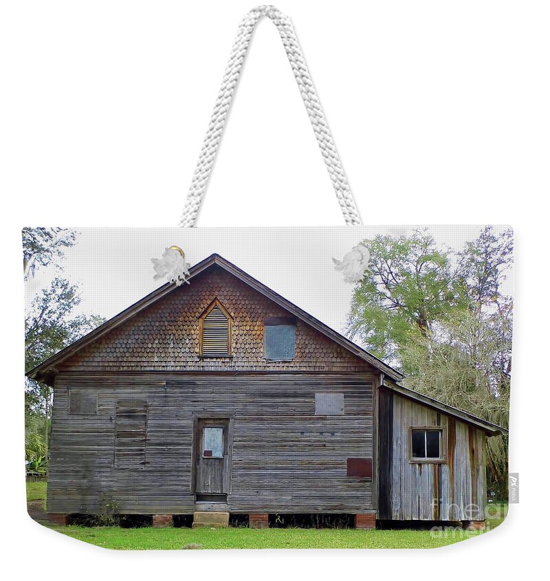 Micanopy Weekender Tote Bag featuring the photograph House Of Many Styles by D Hackett