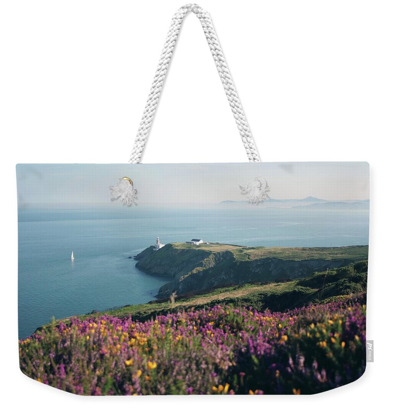 Howth Weekender Tote Bag featuring the photograph Howth_ireland Lighthouse by Rosalba Porpora