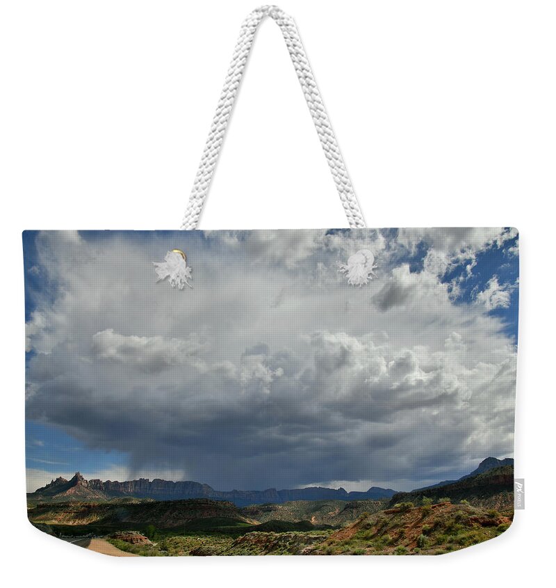 Zion National Park Weekender Tote Bag featuring the photograph Huge Storm Cloud over Utah Highway 9 near Zion NP by Ray Mathis