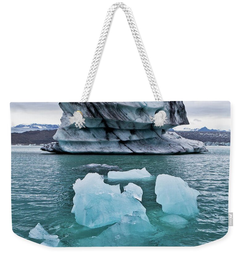 Iceberg Weekender Tote Bag featuring the photograph Icebergs On Jokulsarlon Glacial Lagoon by Arctic-images