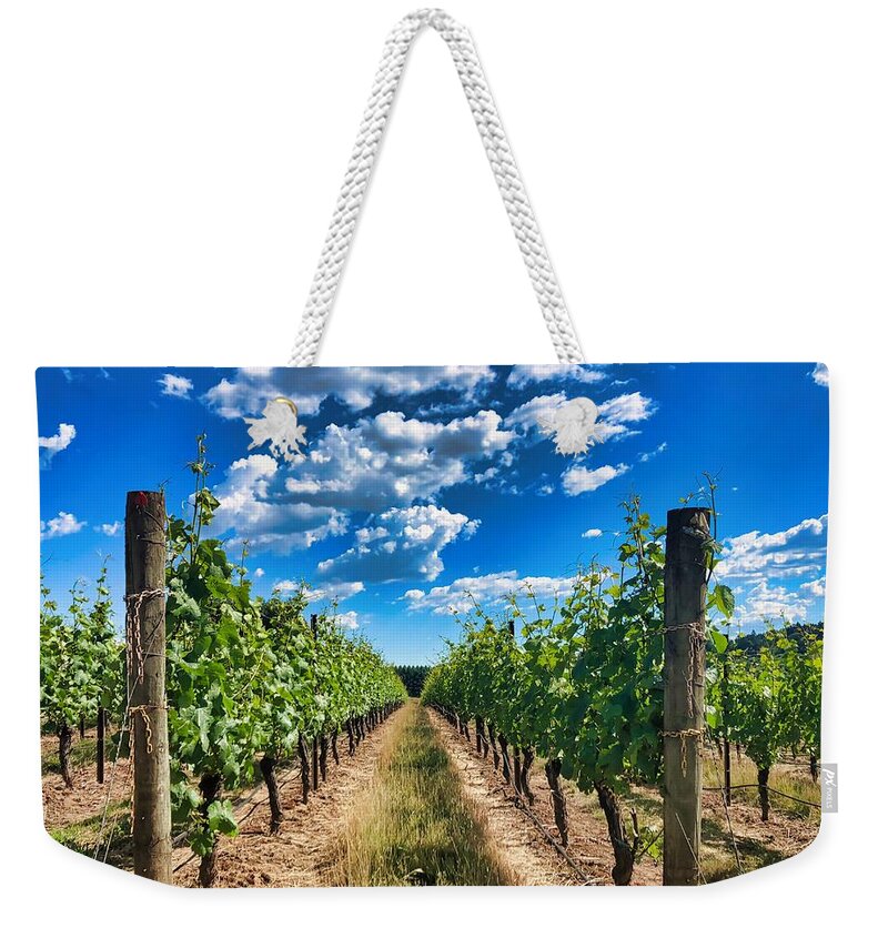 Vineyard Weekender Tote Bag featuring the photograph In The Vineyard by Brian Eberly