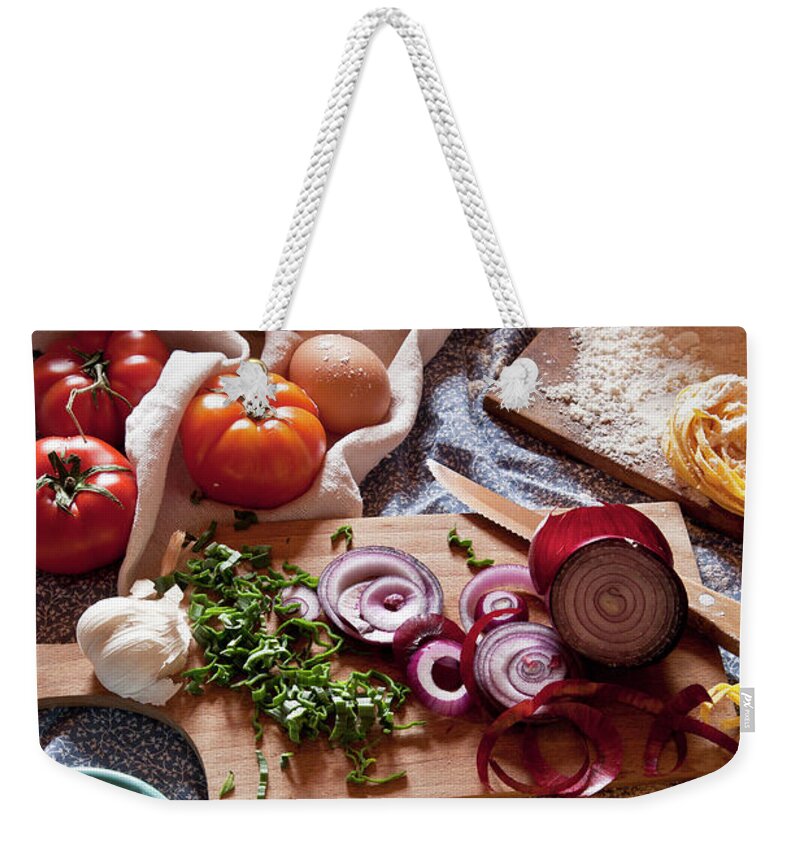 Cheese Weekender Tote Bag featuring the photograph Ingredients For Italian Pasta And by Buena Vista Images