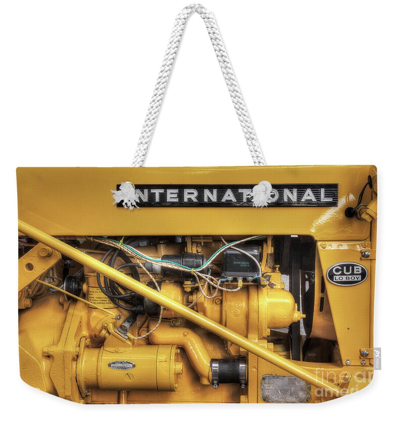Tractor Weekender Tote Bag featuring the photograph International Cub Engine by Mike Eingle