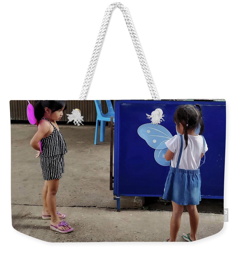 X380 Weekender Tote Bag featuring the photograph Is there something wrong with your wings by Jeremy Holton