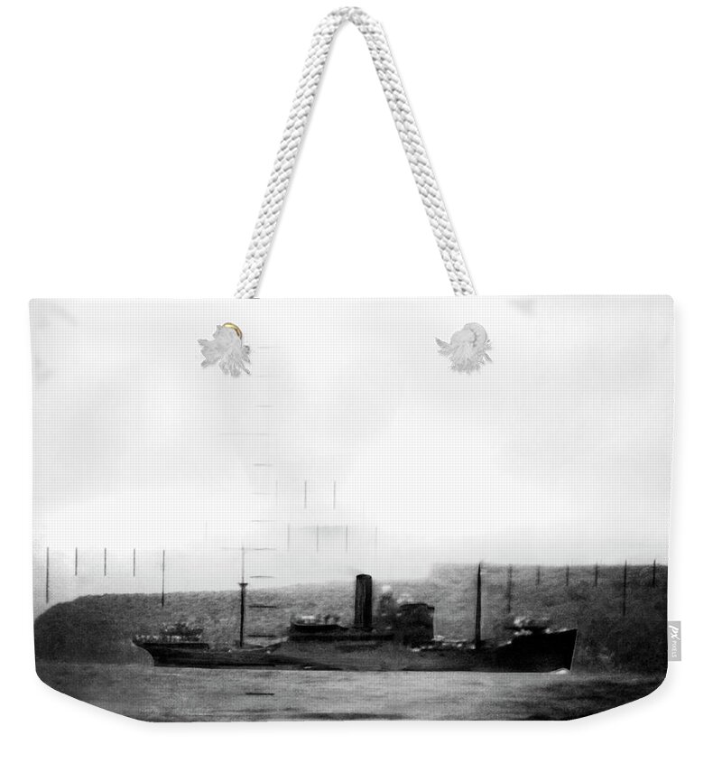 1940s Weekender Tote Bag featuring the photograph Japanese Freighter Targeted by Underwood Archives