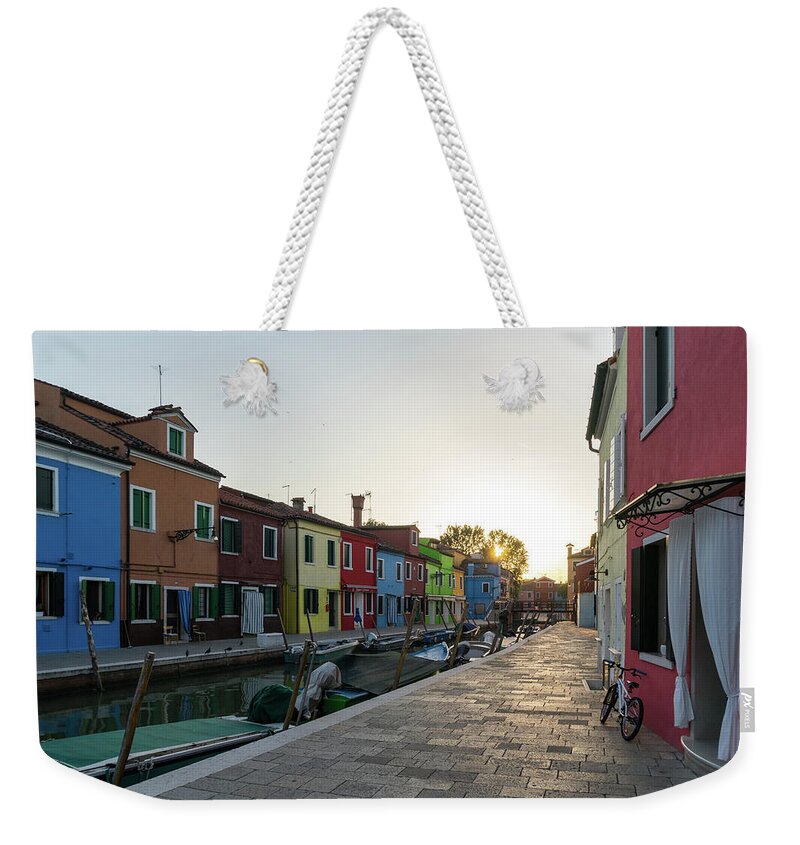 Georgia Mizuleva Weekender Tote Bag featuring the photograph Jewel-toned Island - Summer Day Finale on Isola di Burano Venice Italy by Georgia Mizuleva