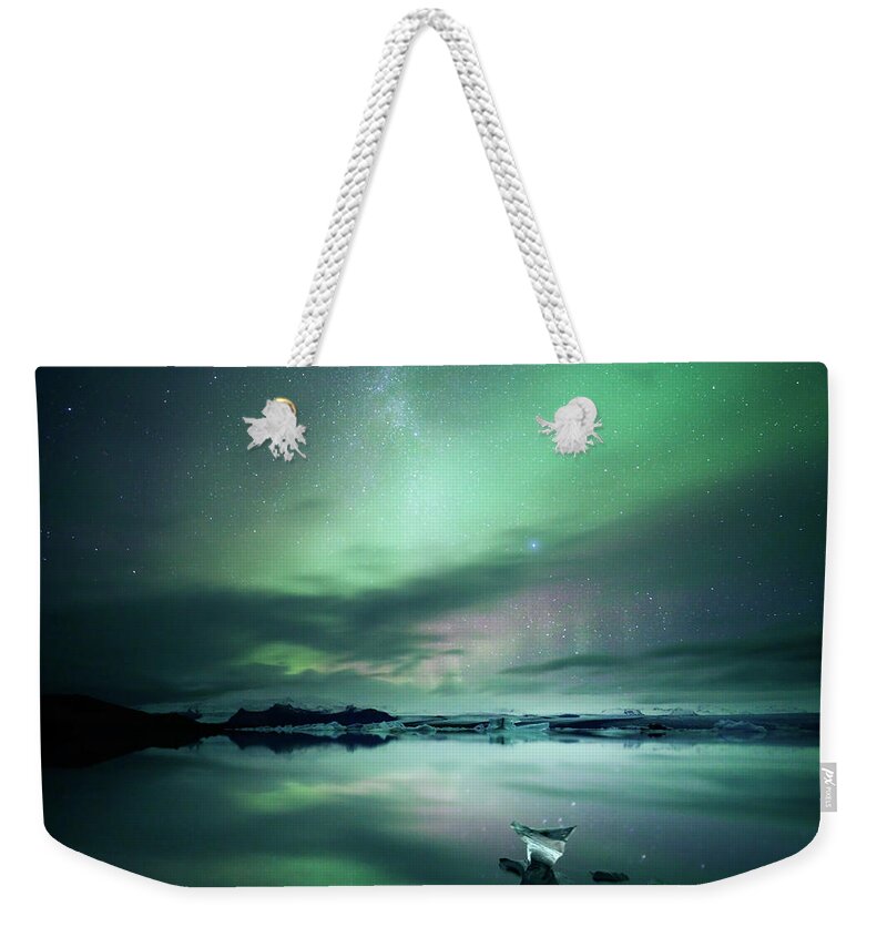 Scenics Weekender Tote Bag featuring the photograph Jokulsarlon Aurora by Matteo Colombo