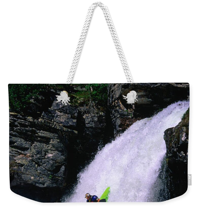 People Weekender Tote Bag featuring the photograph Kayaker Going Down Waterfall Of Store by Anders Blomqvist