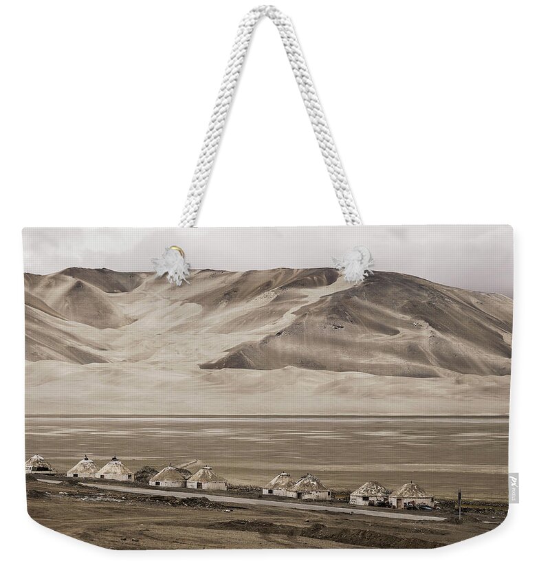 In A Row Weekender Tote Bag featuring the photograph Kyrgyz Village On Karakorum Highway by Photography By Daniel Frauchiger, Switzerland