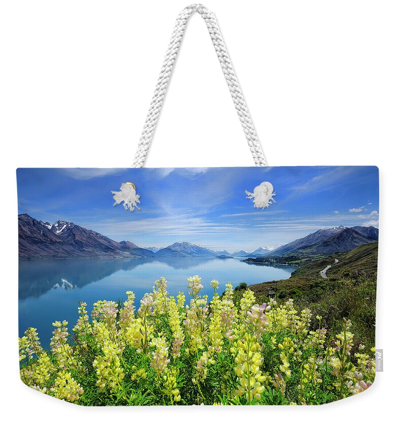 Tranquility Weekender Tote Bag featuring the photograph Lake Wakatipu by Thienthongthai Worachat