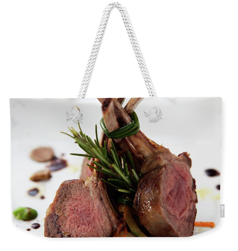White Background Weekender Tote Bag featuring the photograph Lamb Shanks On Plate by Johner Images