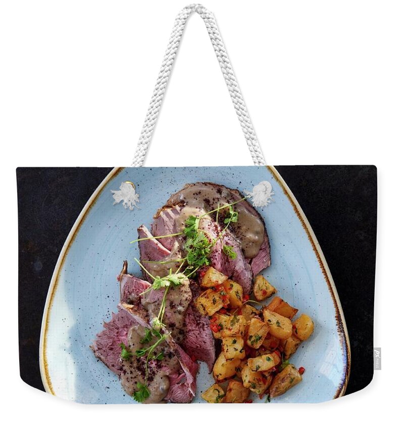 Ip_12340183 Weekender Tote Bag featuring the photograph Lamb With Potato Cubes lebanon by Robbert Koene