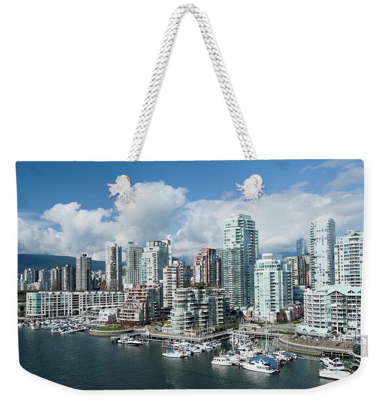 Water's Edge Weekender Tote Bag featuring the photograph Landscape Of City Vancouver In Canada by Deejpilot
