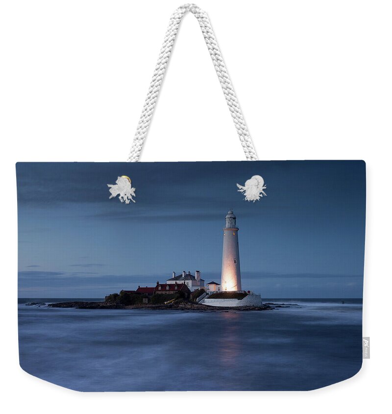Lighthouse Weekender Tote Bag featuring the photograph Leave a light on for me by Anita Nicholson