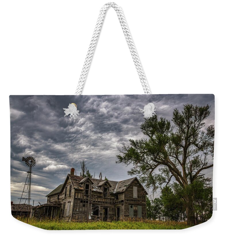  Weekender Tote Bag featuring the photograph Left to Rot by Darren White