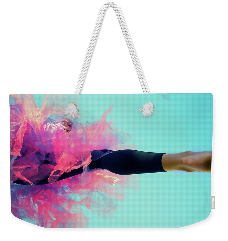 Ballet Dancer Weekender Tote Bag featuring the photograph Leg Extended With Tutu by Michelle Emert