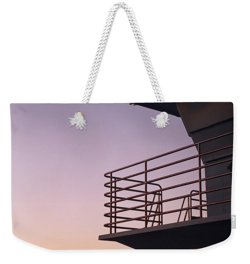 Scenics Weekender Tote Bag featuring the photograph Lifeguard Stand On Beach At Sunset by Lisa Romerein
