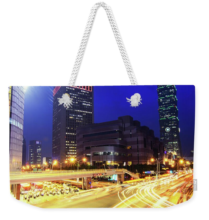 Elevated Walkway Weekender Tote Bag featuring the photograph Light Trails And Taipei 101 by Joyoyo Chen
