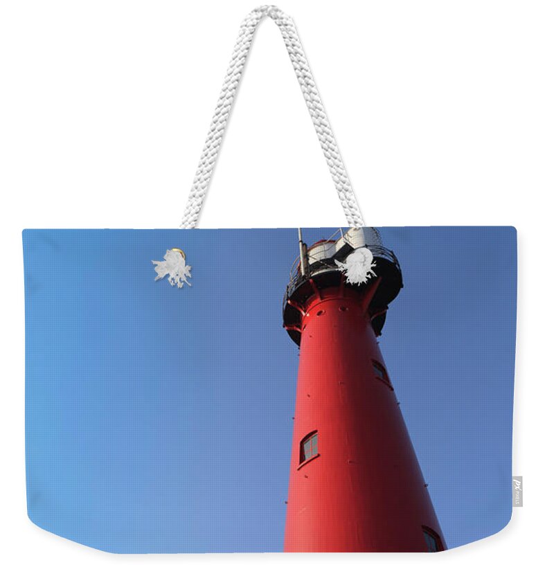 Nautical Equipment Weekender Tote Bag featuring the photograph Lighthouse Of Hoek Van Holland Against by Gaps
