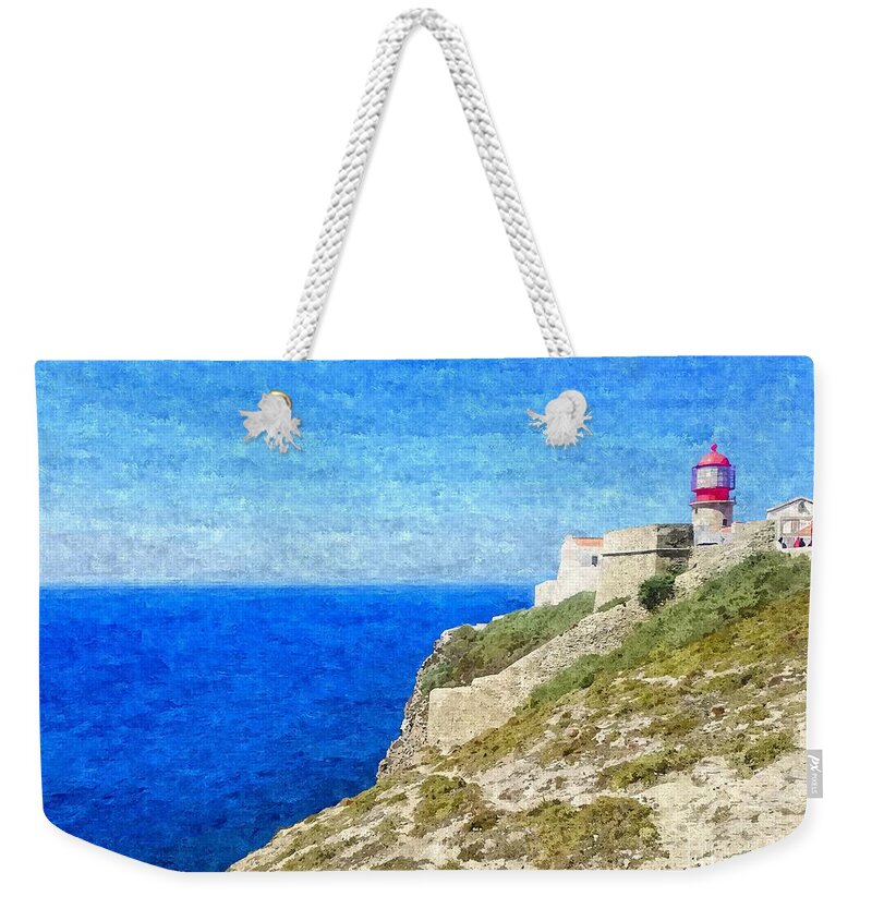 Art Weekender Tote Bag featuring the photograph Lighthouse on top of a cliff overlooking the blue ocean on a sunny day, painted in oil on canvas. by Joaquin Corbalan