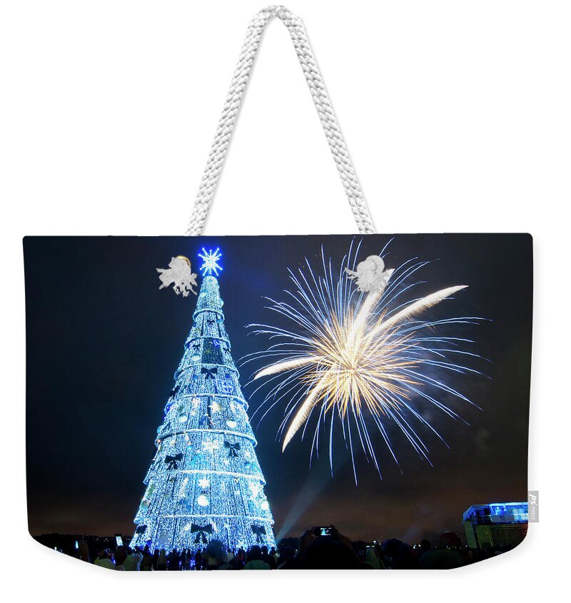 Crowd Weekender Tote Bag featuring the photograph Lightning Of Tower At Night by Levi Bianco