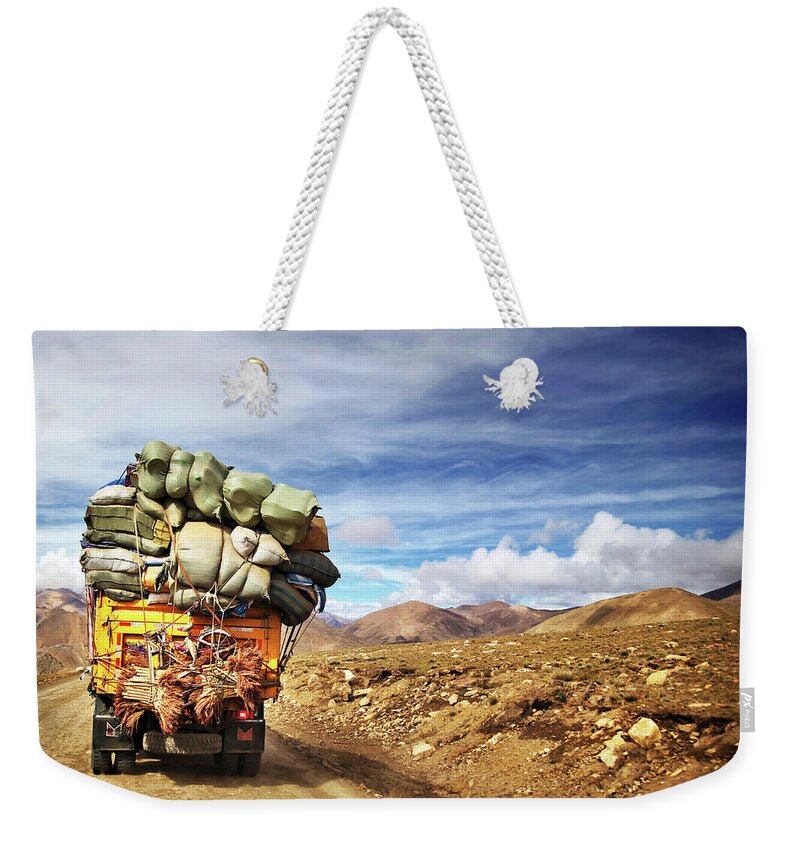 Scenics Weekender Tote Bag featuring the photograph Loaded Truck With Bags In Himalaya by Nicole Kucera