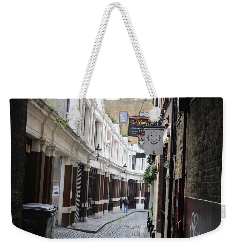 London Weekender Tote Bag featuring the photograph London Alley by Laura Smith