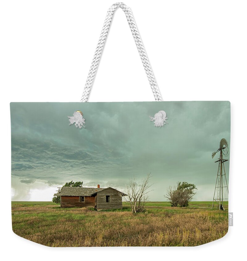 Colorado Weekender Tote Bag featuring the photograph Lonely by Laura Hedien
