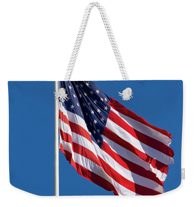 Long May She Wave Weekender Tote Bag featuring the photograph Long May She Wave by Bonnie Follett