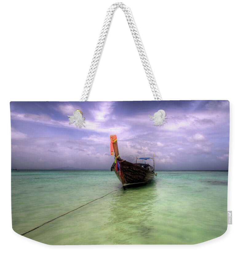 Tranquility Weekender Tote Bag featuring the photograph Long-tail Boat, Phi Phi Island, Thailand by Kateryna Negoda