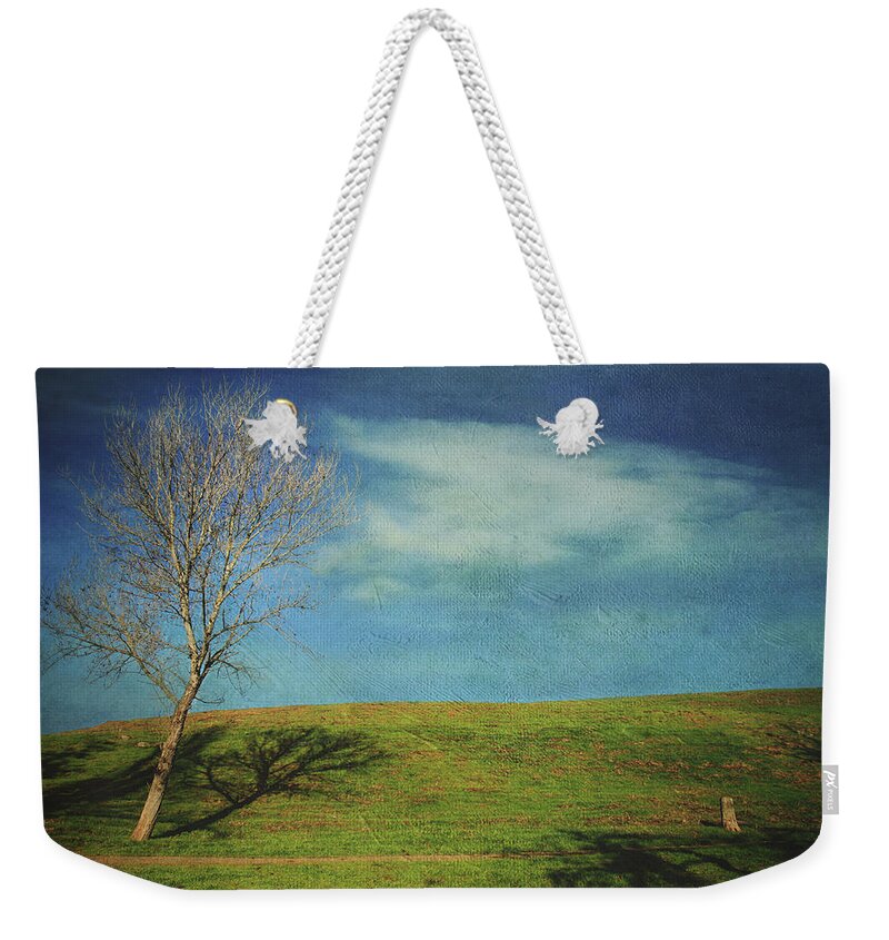 Hayward Weekender Tote Bag featuring the photograph Loss and Survival by Laurie Search