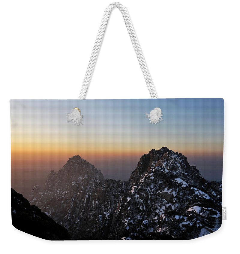 Tranquility Weekender Tote Bag featuring the photograph Lotus & Celestial Capital by Photo By Zouzou