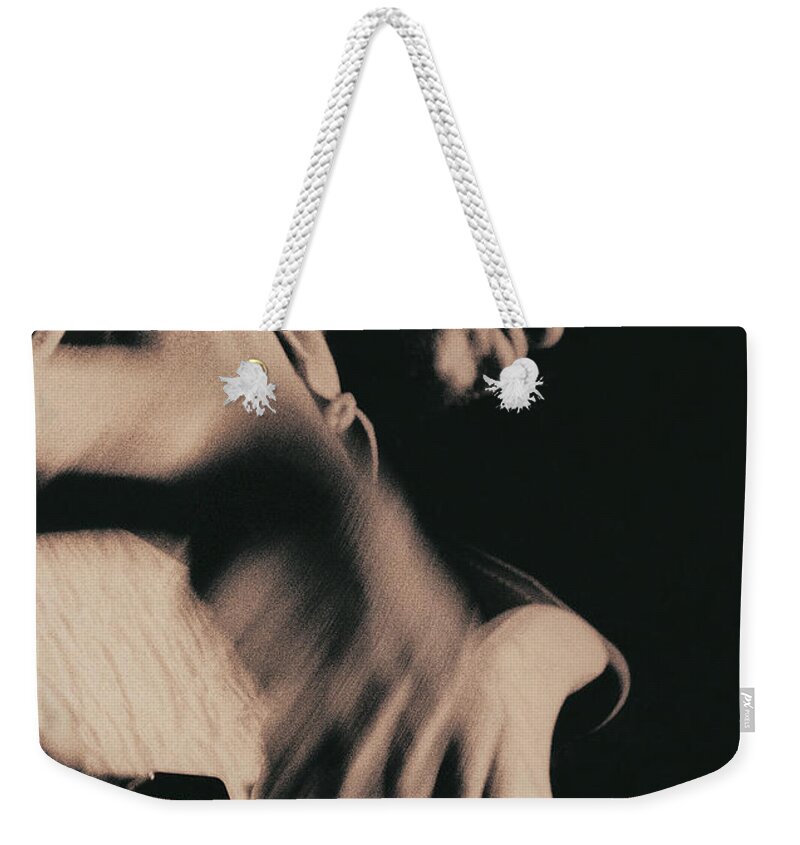 Mature Adult Weekender Tote Bag featuring the photograph Low Angle Shot Of Guitarist by Digital Vision.