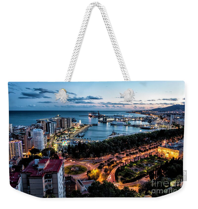 Spain Weekender Tote Bag featuring the photograph Malaga At NIght by Timothy Hacker
